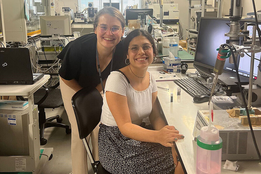 Students Hanne Thiemann and Nicol Jaramillo in the laboratory of the Hydrogen and Fuel Cell Nanomaterials Centre at Yamanashi University.